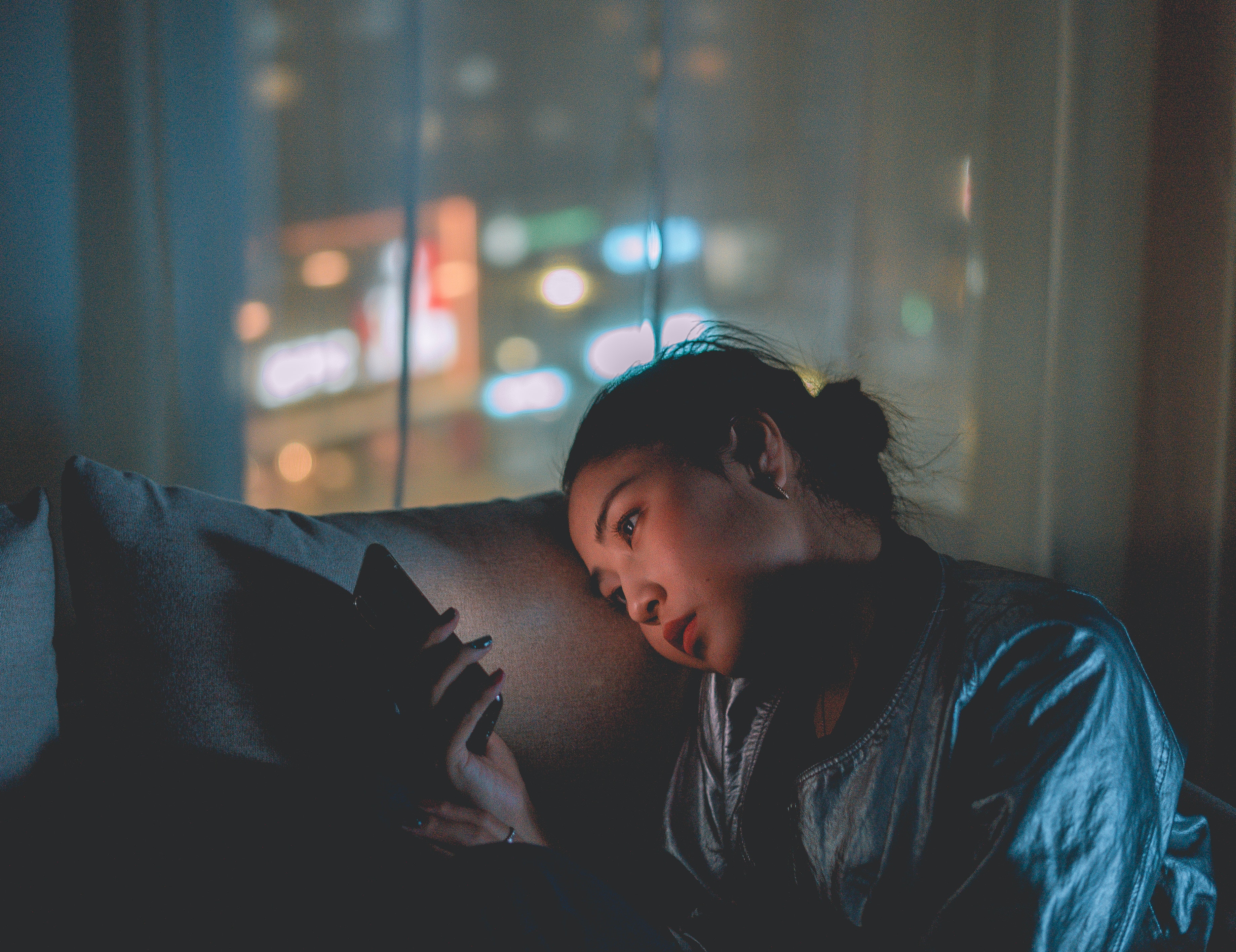 photo of woman using mobile phone 3367850