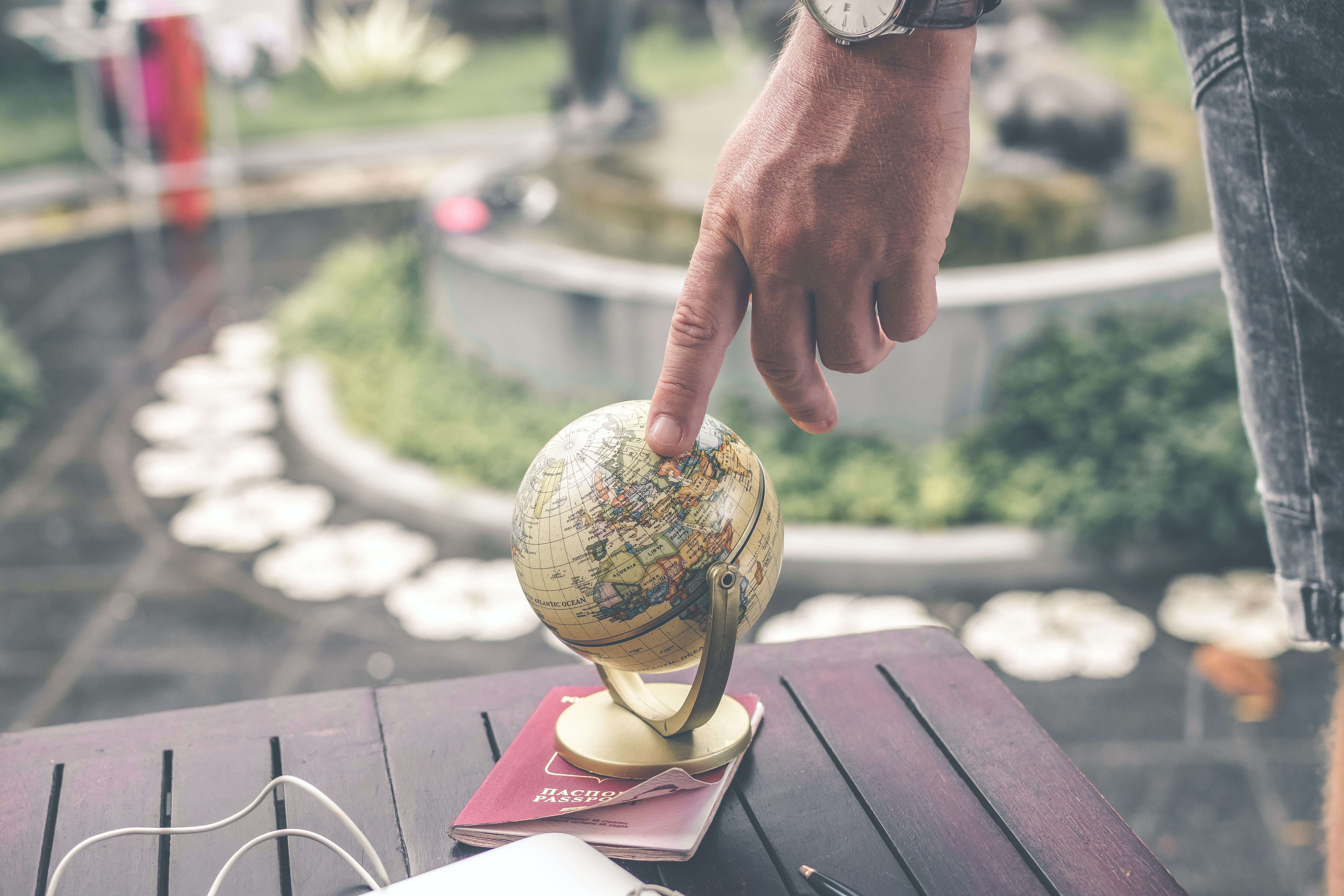 person holding terrestrial globe scale model taken 1079033