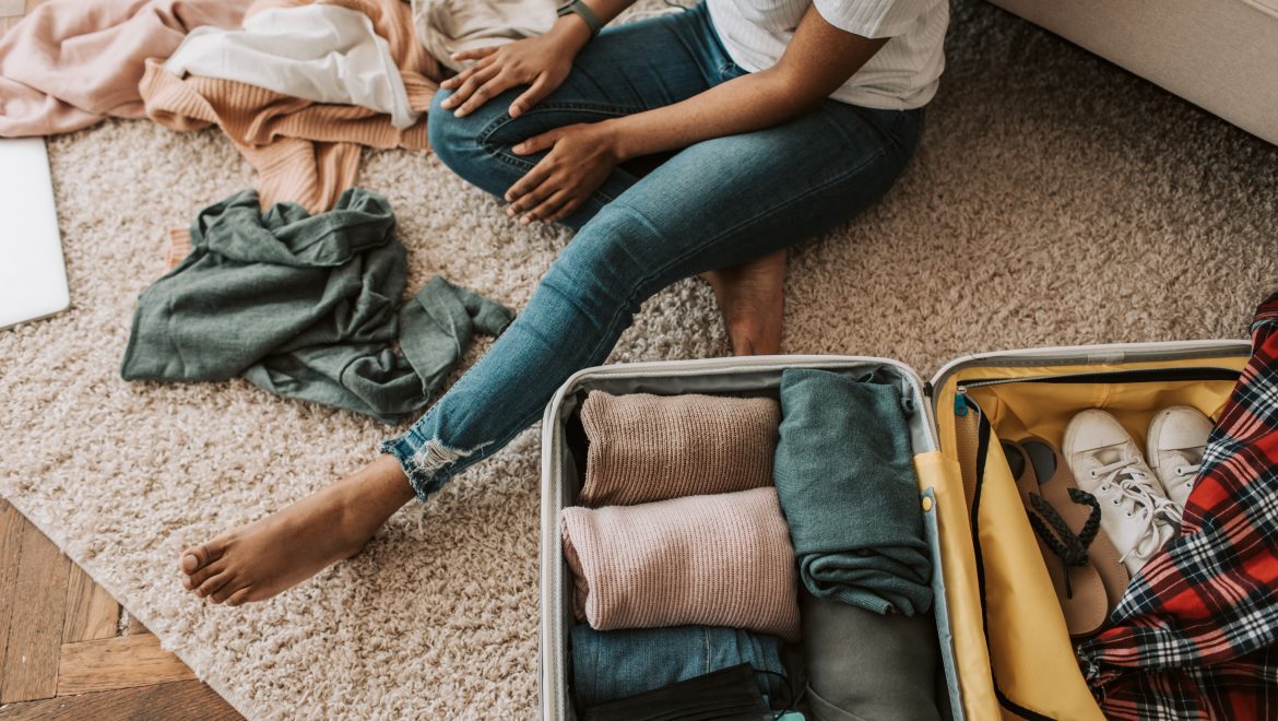 long distance expat relationships woman packing suitcase expat nest